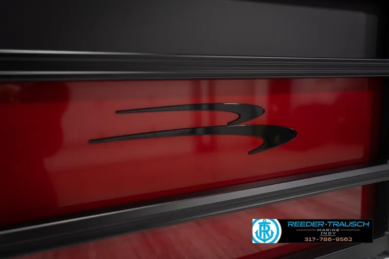 Slide: The Image of 2026 Bennington 22 SLJ boat logo on red and black background. - 49