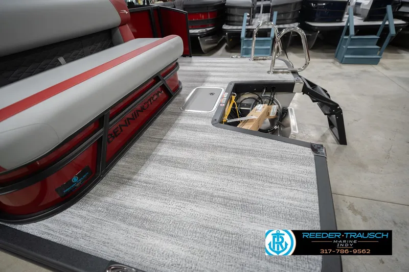 Slide: The Image of 2026 Bennington 22 SLJ pontoon boat interior with seating and storage compartment. - 57