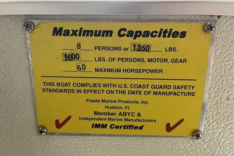 Slide: The Image of 2022 Fiesta 16 Fish N Fun boat capacity plate, 8 persons, 1350 lbs, 60 horsepower. - 13