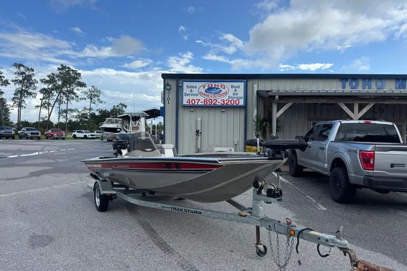 Slide: The Image of 2020 Tracker boat on trailer outside Toho Marine & Outdoors store. - 4