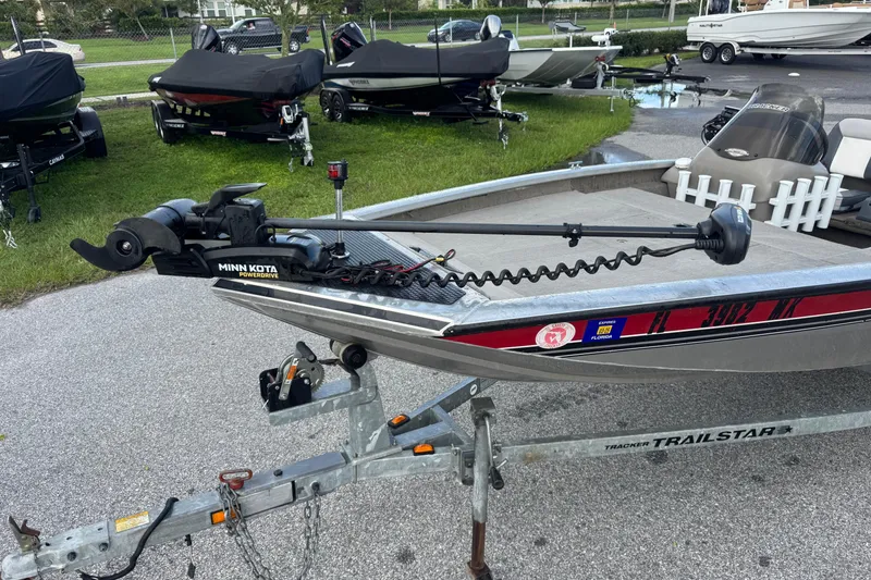 Slide: The Image of 2020 Tracker boat with Minn Kota PowerDrive motor on a Trailstar trailer. - 7