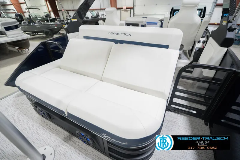 Slide: The Image of 2026 Bennington 24 MCSB boat interior with white seating, showcased at Reeder-Trausch Marine. - 35