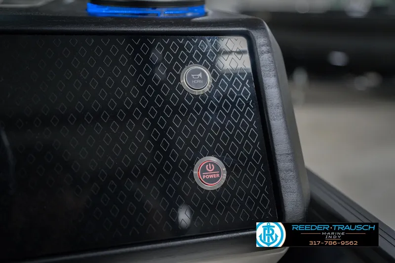 Slide: The Image of Control panel of 2026 Bennington 24 MCSB with horn and power buttons. - 44