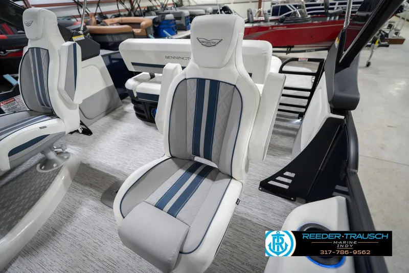 Slide: The Image of 2026 Bennington 24 MCSB boat interior with stylish seating and modern design. - 48