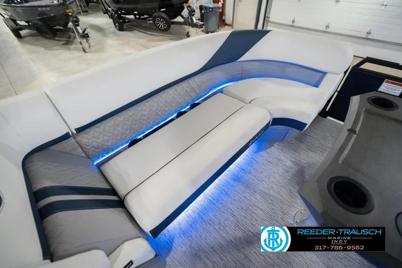 Slide: The Image of Luxurious seating on 2026 Bennington 24 MCSB boat with blue LED lighting. - 49