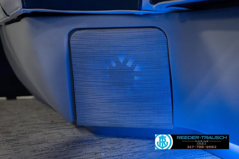 Slide: The Image of 2026 Bennington 24 MCSB boat interior with blue LED lighting detail. - 51