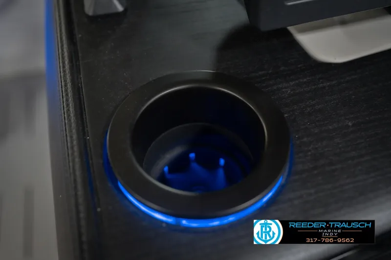 Slide: The Image of LED-lit cup holder on 2026 Bennington 24 MCSB boat console. - 54