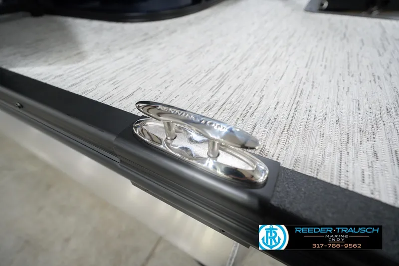 Slide: The Image of 2026 Bennington 24 MCSB boat cleat detail with Reeder Trausch Marine logo. - 68