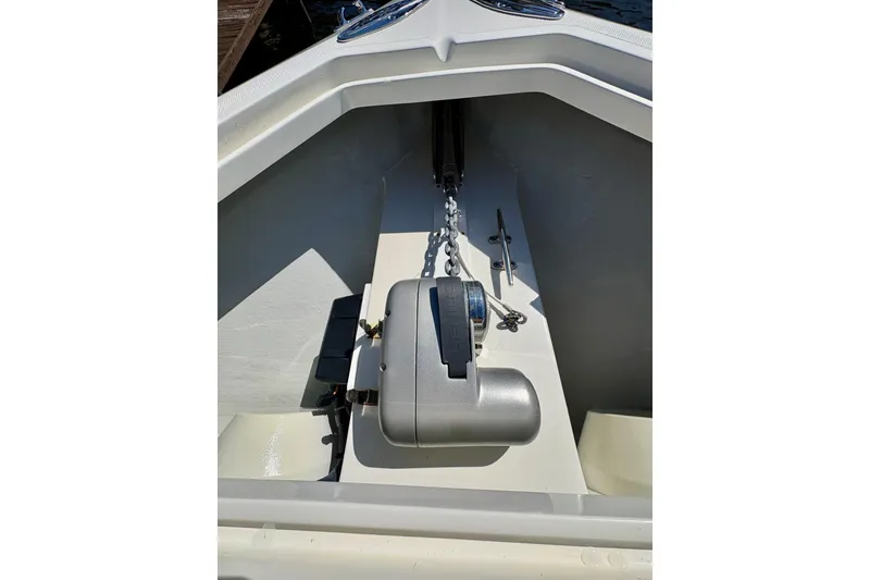 Slide: The Image of 2019 SeaVee 370z boat anchor system with chain and winch in bow compartment. - 14
