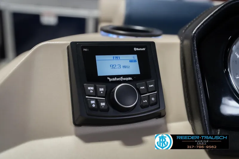 Slide: The Image of 2026 Bennington 21 SLJ boat dashboard with Rockford Fosgate audio system display. - 31