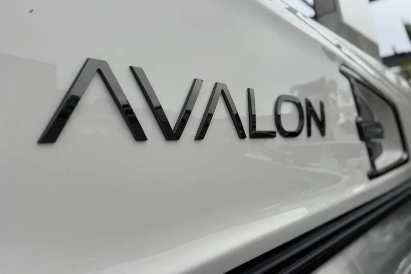 Slide: The Image of Close-up of 2026 Avalon Excalibur 27' logo on white surface. - 12