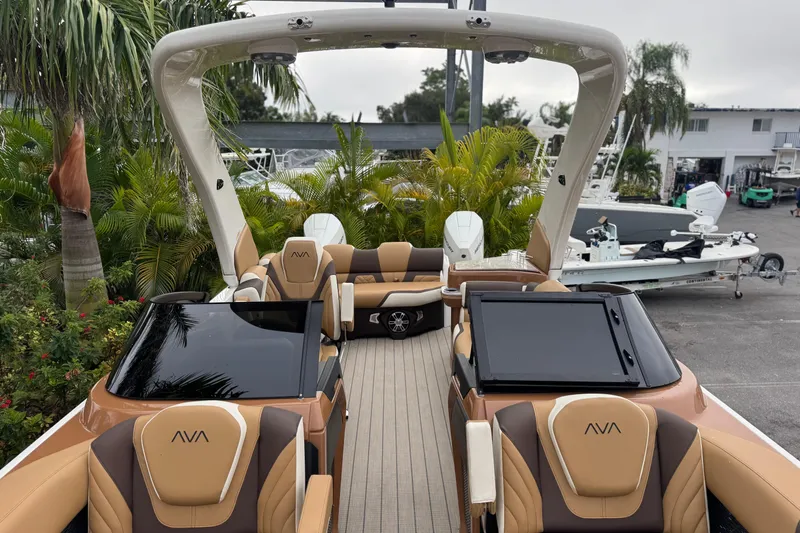 Slide: The Image of Luxurious 2026 Avalon Excalibur 27' boat with elegant seating and modern design. - 22