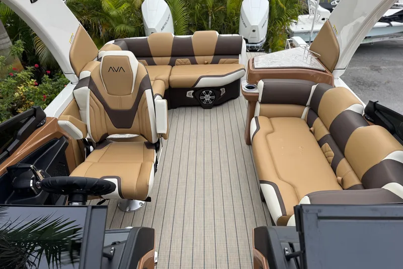 Slide: The Image of Luxurious interior of 2026 Avalon Excalibur 27' boat with plush seating and modern design. - 24