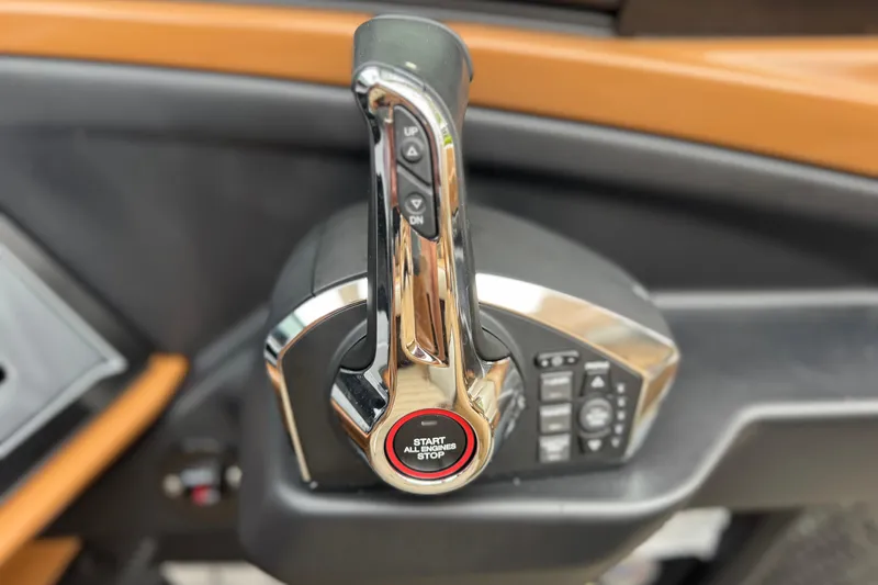 Slide: The Image of Throttle control of 2026 Avalon Excalibur 27' boat with start/stop button. - 31