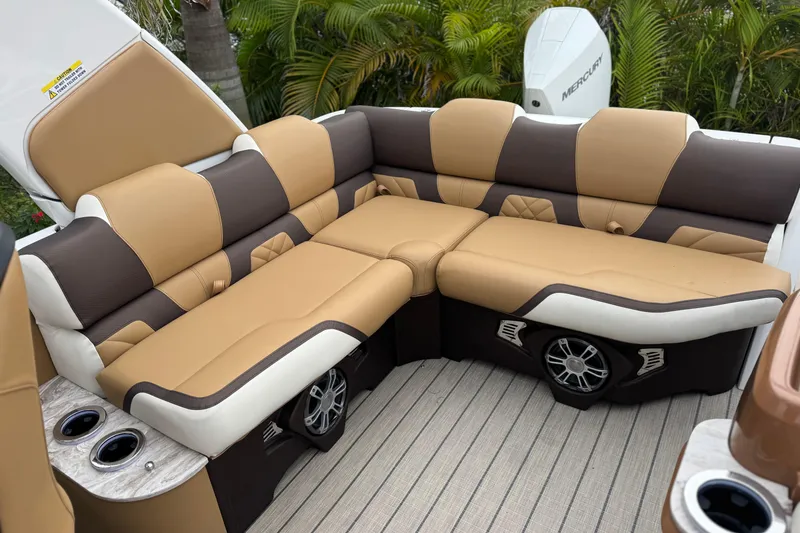Slide: The Image of Luxurious seating on 2026 Avalon Excalibur 27' boat with tan and brown upholstery. - 33