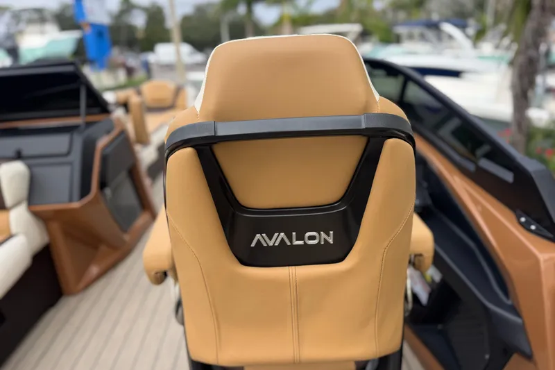 Slide: The Image of Luxurious Avalon Excalibur 27' boat seat, 2026 model, with tan upholstery and sleek design. - 43