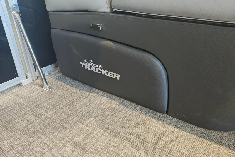 Slide: The Image of 2026 Sun Tracker Party Barge 20 DLX interior detail with logo on seating. - 23