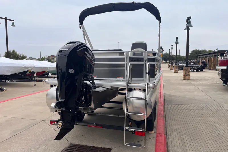 Slide: The Image of 2026 Sun Tracker Fishin' Barge 20 DLX pontoon boat with Mercury outboard motor. - 101
