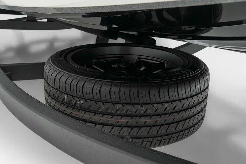 Slide: The Image of 2026 Nitro Z21 XL Pro boat interior storage compartments open. - 12