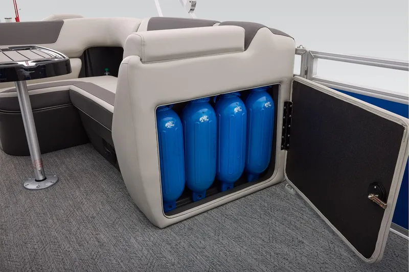 Slide: The Image of 2026 Sun Tracker Fishin' Barge 20 DLX interior seating, featuring gray and black upholstery. - 73