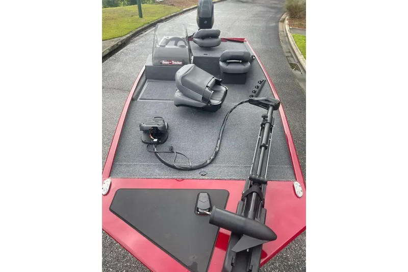 Slide: The Image of 2026 Tracker Bass Tracker Classic XL boat with seating and trolling motor on deck. - 2