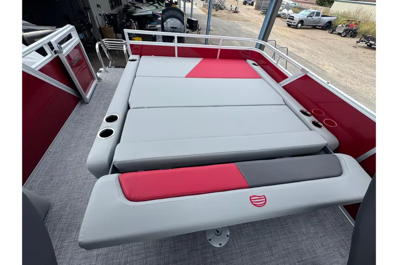Slide: The Image of 2026 Sun Tracker Party Barge 22 RF DLX with spacious seating and cup holders. - 19