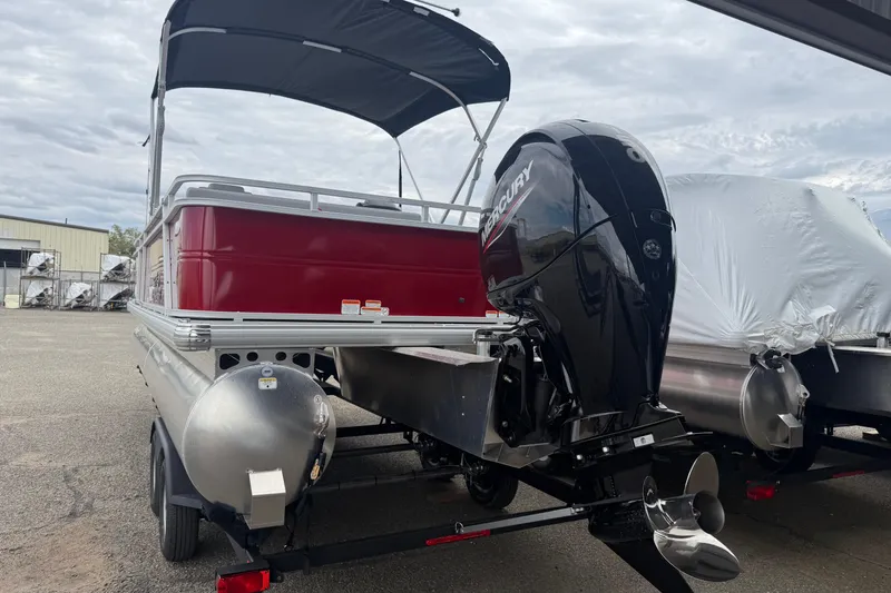 Slide: The Image of 2026 Sun Tracker Party Barge 22 RF DLX pontoon boat with Mercury outboard motor. - 4