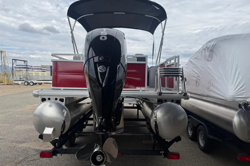 Slide: The Image of 2026 Sun Tracker Party Barge 22 RF DLX pontoon boat with powerful outboard motor. - 5