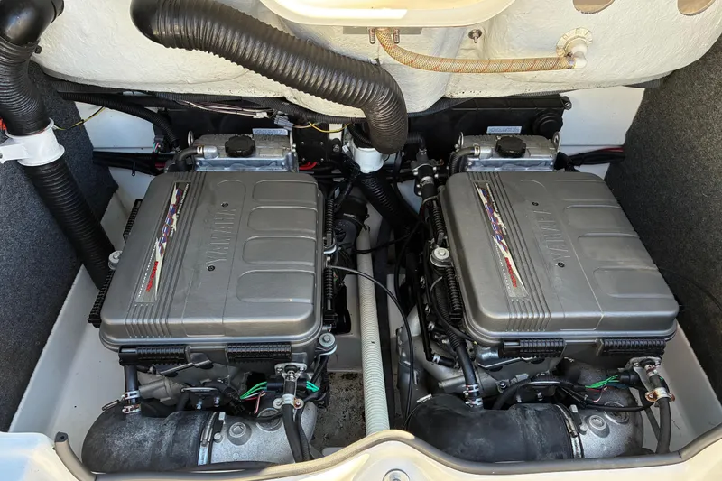 Slide: The Image of 2007 Yamaha Boats SX230 engine compartment with dual engines and visible components. - 19