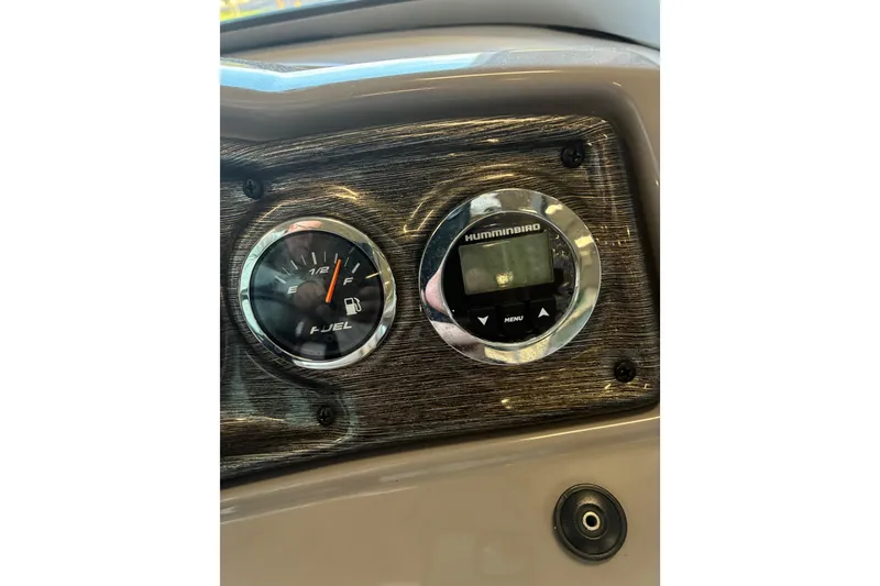 Slide: The Image of Dashboard of 2007 Yamaha Boats SX230 with fuel gauge and Humminbird display. - 22