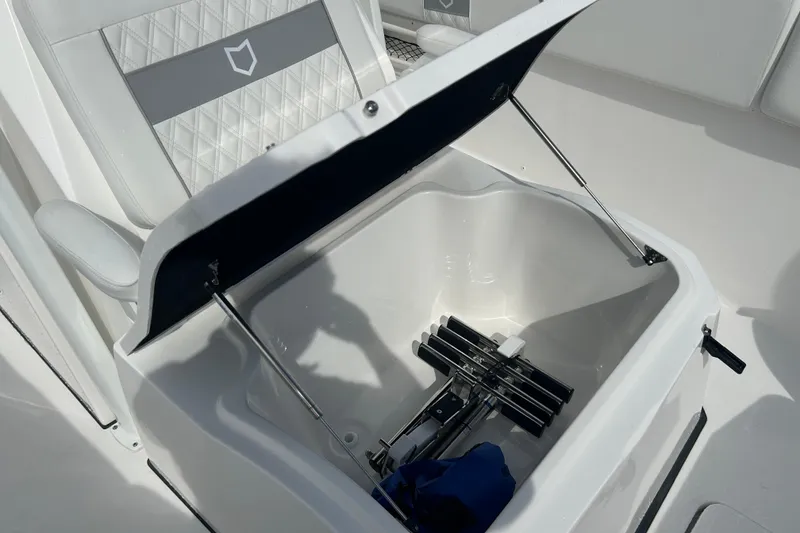 Slide: The Image of Storage compartment on 2026 Sea Fox 268 Commander boat with cushioned seating. - 19