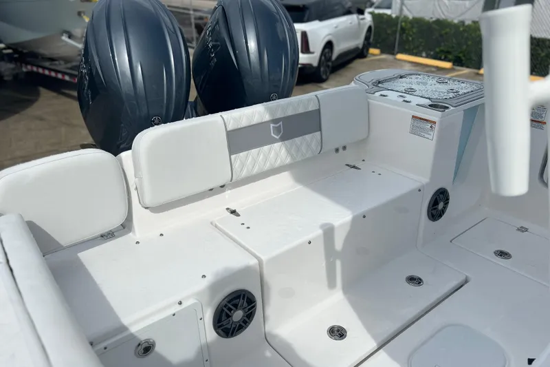 Slide: The Image of 2026 Sea Fox 268 Commander boat interior with dual engines and seating area. - 22