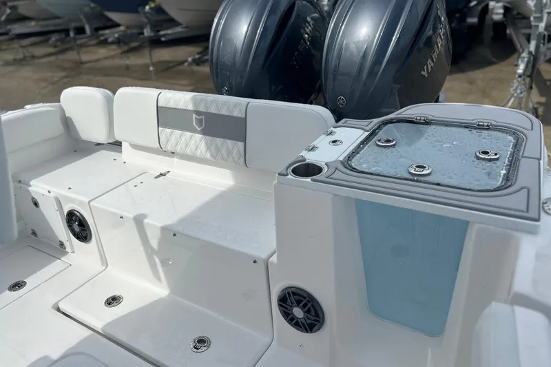 Slide: The Image of 2026 Sea Fox 268 Commander boat interior with Yamaha engines, featuring seating and storage. - 23