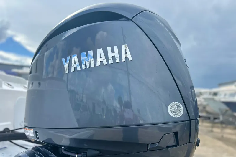 Slide: The Image of Yamaha outboard motor on 2026 Sea Fox 268 Commander boat, cloudy sky background. - 40