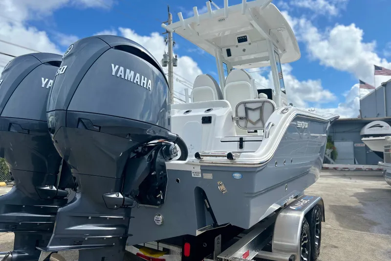 Slide: The Image of 2026 Sea Fox 268 Commander boat with dual Yamaha engines on a trailer. - 43