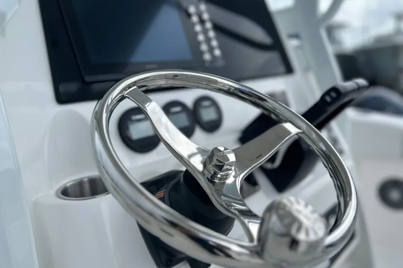 Slide: The Image of Steering wheel of 2026 Sea Fox 268 Commander boat with control panel. - 5