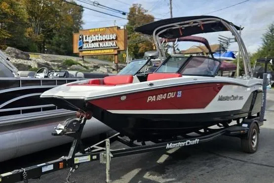 The Image of 2017 MasterCraft NXT20 boat on trailer at Lighthouse Harbor Marina. - 1