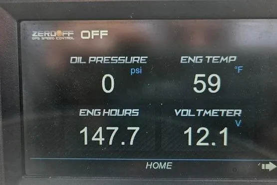 Slide: The Image of Display screen of a 2017 MasterCraft NXT20 showing engine metrics and settings. - 2