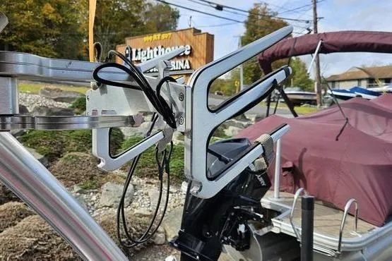 Slide: The Image of 2017 MasterCraft NXT20 boat with wakeboard rack at marina. - 9