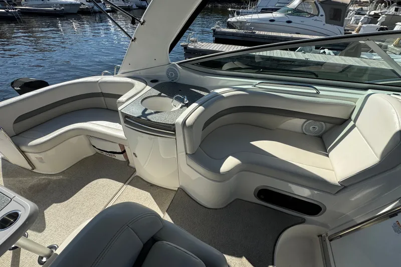 Slide: The Image of 2007 Chaparral Signature 330 boat interior with plush seating and sleek design. - 12