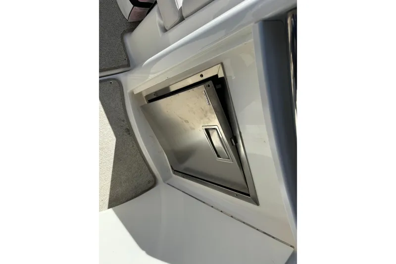 Slide: The Image of 2007 Chaparral Signature 330 boat interior with built-in stainless steel compartment. - 15