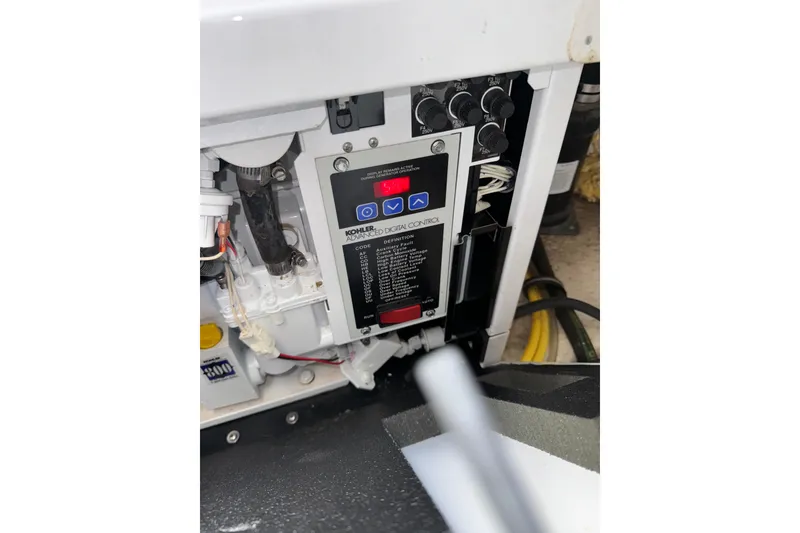 Slide: The Image of Control panel of a 2007 Chaparral Signature 330 boat engine compartment. - 38