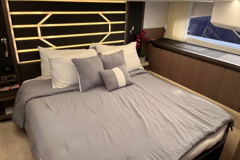 Slide: The Image of Luxurious bedroom interior of 2024 Galeon 425 HTS yacht with modern design and elegant lighting. - 25