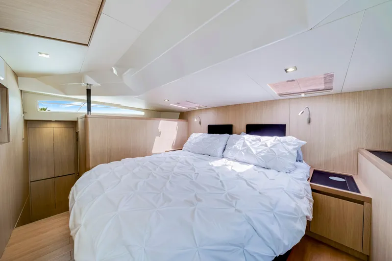 Slide: The Image of Luxurious interior of 2019 Aquila 44 Yacht with modern furnishings and natural light. - 14