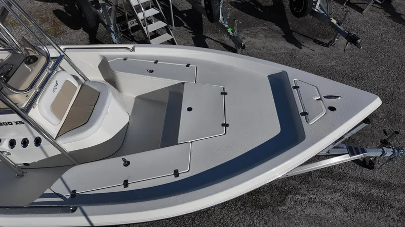Slide: The Image of 2025 Bulls Bay 2200XS boat, aerial view, showcasing deck layout and seating. - 10