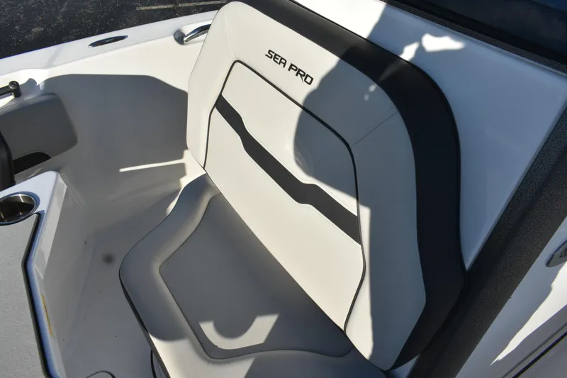 Slide: The Image of 2025 Sea Pro 245FLX Sandbar boat seat, featuring sleek design and comfortable padding. - 10