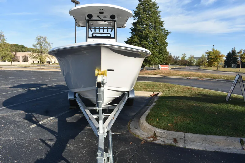 Slide: The Image of 2025 Sea Pro 245FLX Sandbar boat on trailer in parking lot. - 3