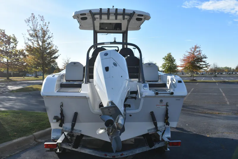 Slide: The Image of 2025 Sea Pro 245FLX Sandbar boat on trailer, rear view in parking lot. - 4