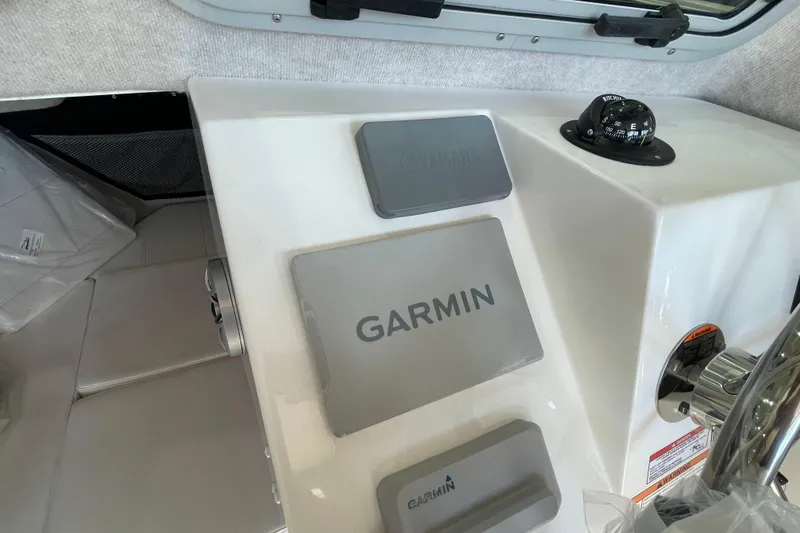 Slide: The Image of Control panel of 2026 Parker 217 Explorer boat with Garmin navigation system. - 15