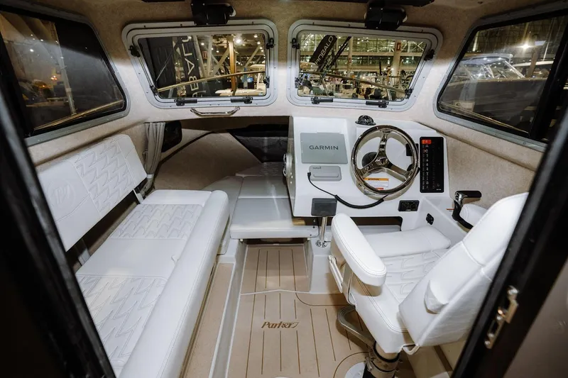 Slide: The Image of Manufacturer Provided Image: Interior of 2026 Parker 217 Explorer boat with modern helm and seating. - 20